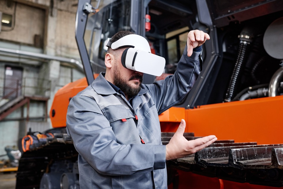 A warehouse employee wearing a VR helmet​
