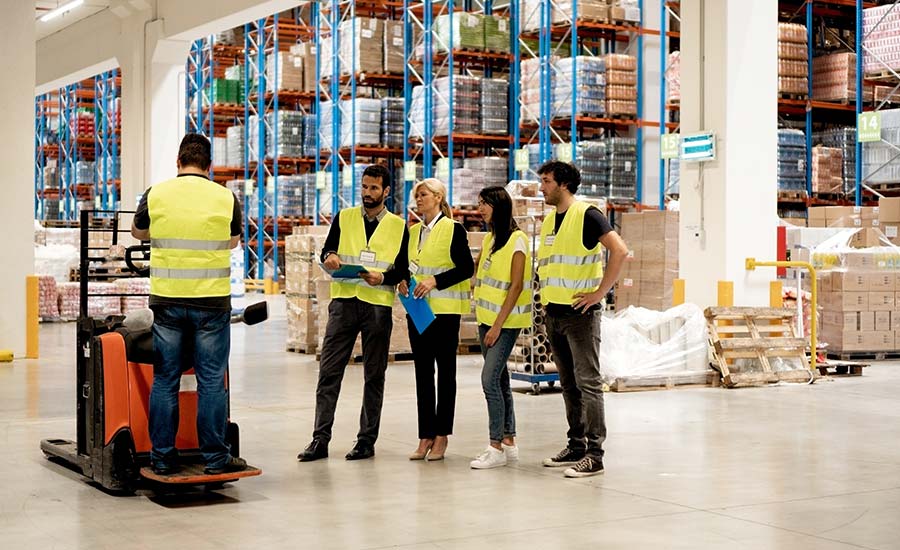 A warehouse employee conducting forklift training​